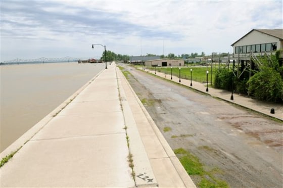 The Ohio River is seen along the flood wall in downtown Cairo, Ill., on Saturday. Cairo Mayor Judson Childs has issued a mandatory evacuation for residents.
